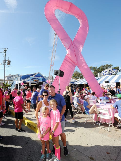 Steve "Monty" Montgomery co-owner of the Starboard in Dewey Beach  with his wife, Dee and kids at the Dewey Goes Pink Event.
Special to the News Journal / CHUCK SNYDER