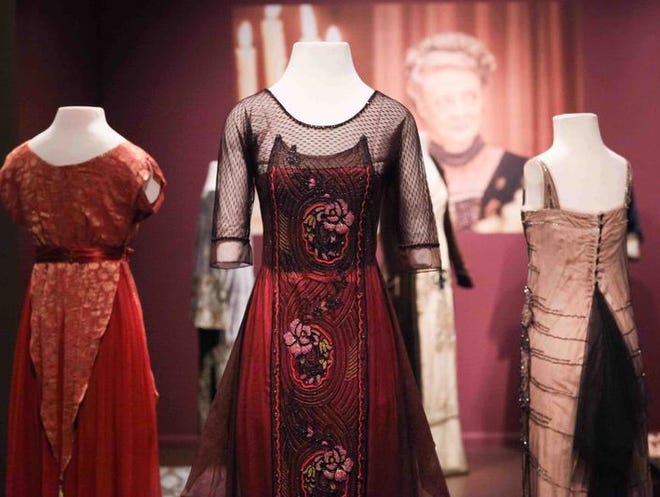 “Costumes of Downton Abbey” immerses museum-goers in scenes from the PBS drama with photos and quotes appearing with the costumes. The exhibit is open through Jan. 4, 2015.