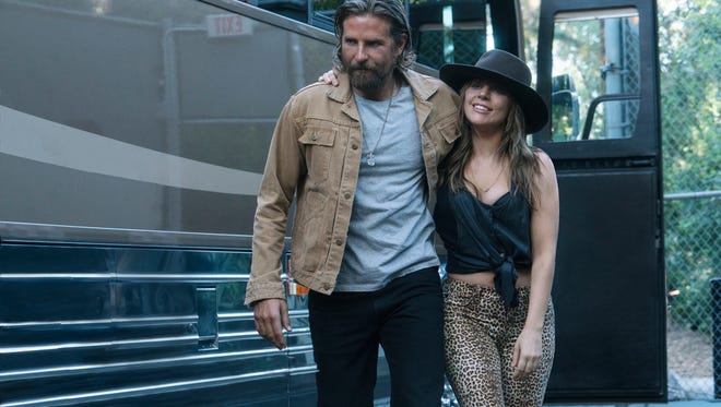 Jackson (Bradley Cooper) and Ally (Lady Gaga) enjoy life on the road in "A Star Is Born."