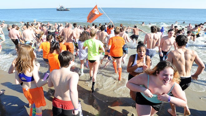 Supporters of Special Olympics Delaware took the Lewes Polar Bear Plunge Sunday, Feb. 5, raising $900,000 for the organization.