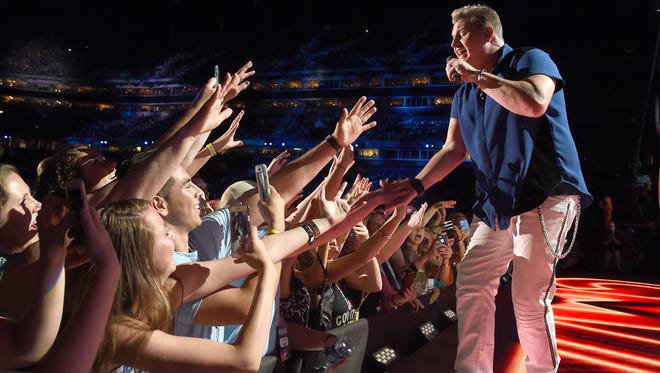Gary LeVox of Rascal Flatts performs at the CMA Festival in Nashville last year. The act returns to Harrington for the Delaware State Fair July 25.