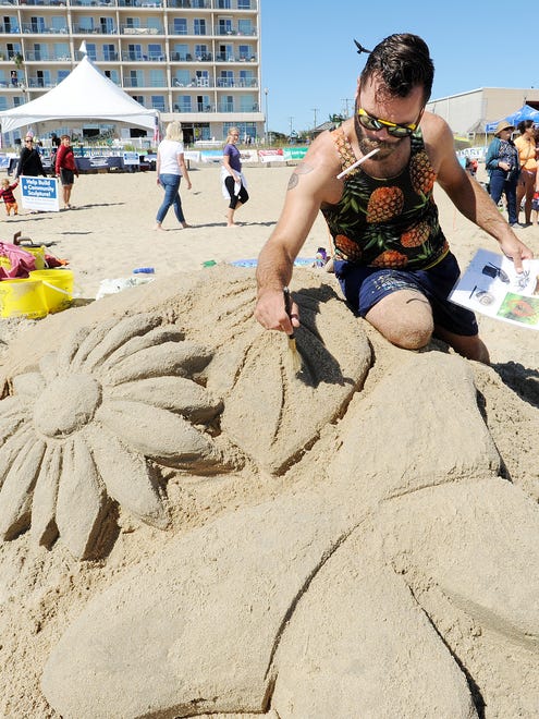 Brandon Schaffer from Cape May with his Butterfly creation as Great weather had many beach artists attend the Rehoboth Beach-Dewey Beach Chamber of Commerce's Annual Sandcastle Contest held on the beach at Brooklyn Avenue in Rehoboth Beach on Saturday September 9th.
Special to the Daily Times / CHUCK SNYDER
