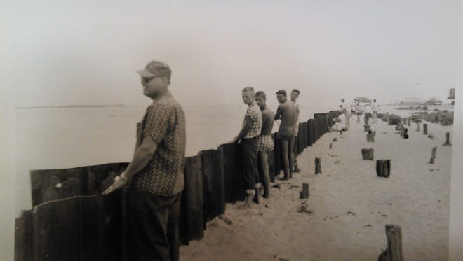 Harry Galbraith (left), Don Shearer, Gary Galbraith, Larry Shearer and Ron Galbraith at the inlet barrier in 1955. Gary is 12.