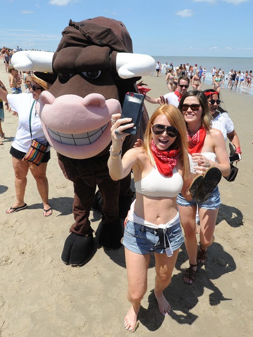 Thousands turned out as the Starboard in Dewey Beach held their 21st "Running of the Bull" on Saturday, June 24 at the Bar and Restaurant on Coastal Highway.
The event which honors the Running of the Bulls in Spain is held every year and features a costumed bull chasing revelers on the beach and ending with a Bull Fight back at the Bar. This year, the "Bull" won as it turned 21, the legal drinking age in Delaware.