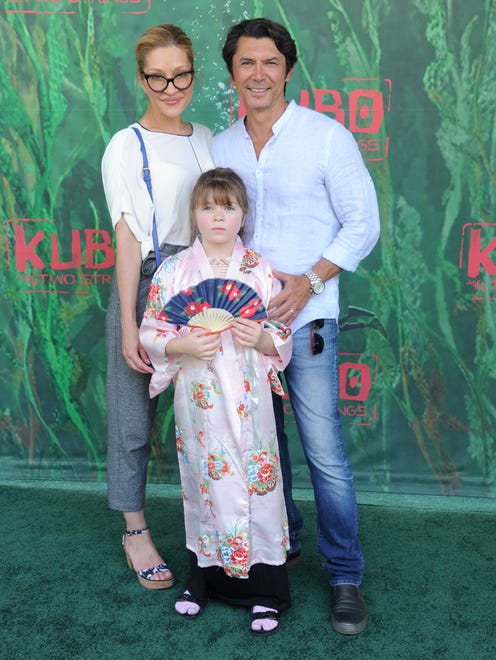UNIVERSAL CITY, CA - AUGUST 14: Actor Lou Diamond Phillips, wife Yvonne Boismier Phillips and daughter Indigo Sanara Phillips arrive at the premiere of Focus Features' "Kubo And The Two Strings" at AMC Universal City Walk on August 14, 2016 in Universal City, California.  (Photo by Gregg DeGuire/WireImage) ORG XMIT: 660307717 ORIG FILE ID: 589533130