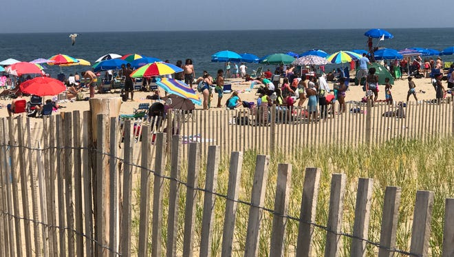 Umbrellas line Rehoboth Beach nearly two months after the tent and canopy ban went into effect. Seen July 14, 2017.