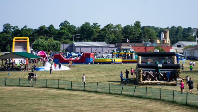 A view from The Great Inflatable Race held in Shrewsbury on Saturday, July 14,2018. The event is families and kids friendly with multiple inflatable obstacles course and some spots with foam.
