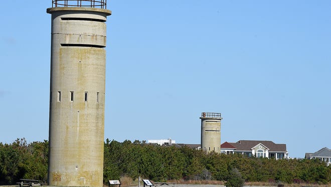 This 2016 file photo shows two of the World War II coastal defense towers located in Delaware Seashore State Park.