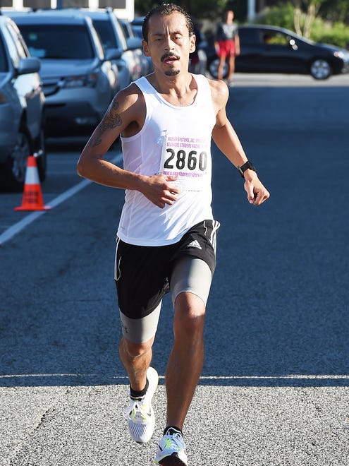 Martin Rodriquez from Selbyville was 2nd as Over 300 runners and walkers turned out for the 19th Annual Run for J.J. 5K & 5K Walk held on Sunday July 24th in downtown Rehoboth Beach.