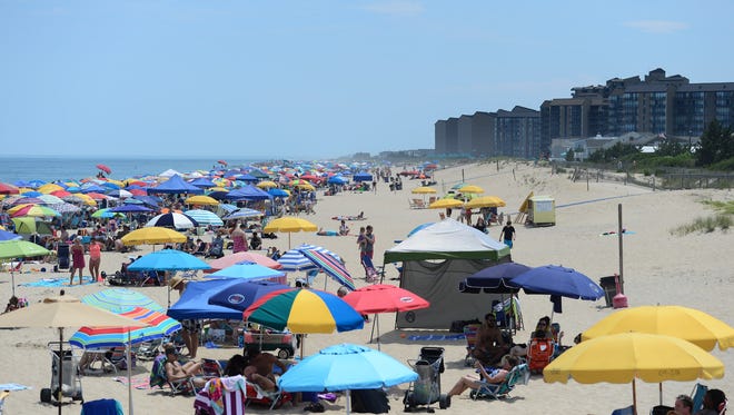 Umbrellas can be seen for miles at Bethany Beach during this holiday week on July 3, 2017.
