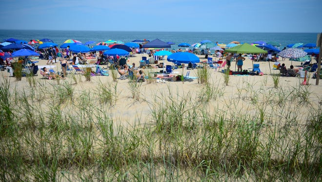 The beaches in Bethany Beach, DE. are full of swimmers and vacationers during the holiday week on July 3, 2017.