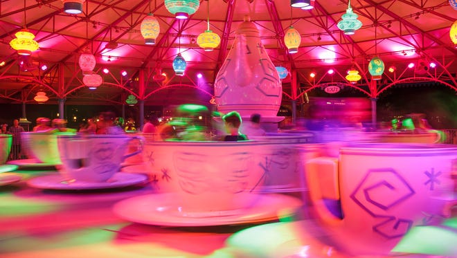The Mad Tea Party features trippy lights and effects to accompany the spinning teacups