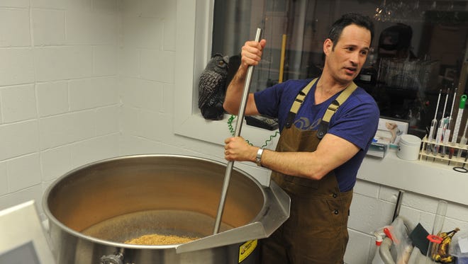 Dogfish Head Brewery founder Sam Calagione working at the brewery.