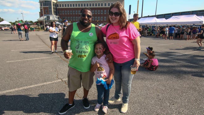 At the first-ever Delaware Taco Festival on Saturday are (from left) Alex, Alexis, 5, and Valerie Hall.