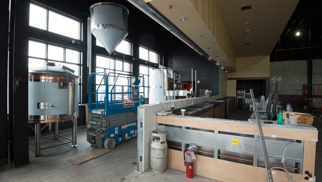 View of the bar and the brewery operation area at the new Iron Hill Brewery and Restaurant in Rehoboth that will be opening at the end of May.