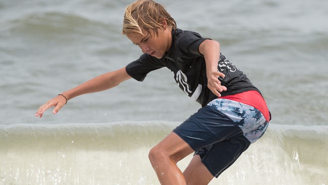 Nick Turdo of Juno Beach, Fla., competes in the semi pro division at the Zap Pro/Amateur World Championships of Skimboarding at Dewey Beach.