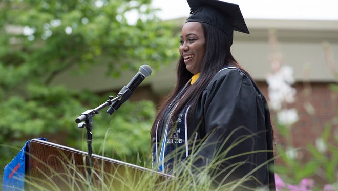 Ms. Destiny Hollis gives her remarks from the senior class at the Wesley College Spring Commencement in Dover.  A total of 244 graduated.