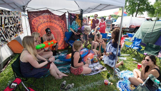 Campers at their campsite at the Firefly Music Festival in Dover.