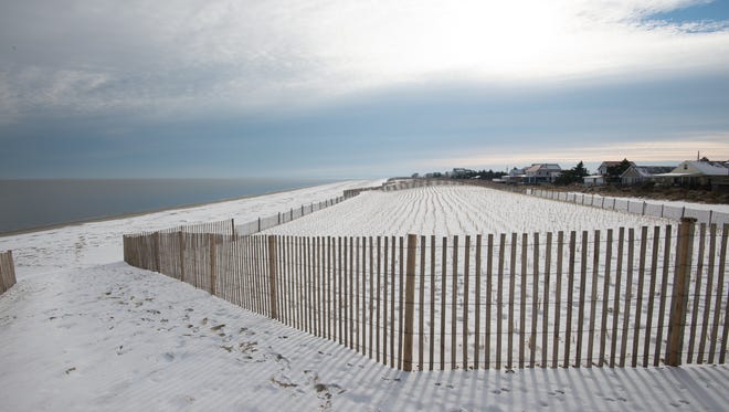 Snow covers the sand at Broadkill Beach.