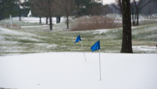 Snow covers the putting green at The Rookery Golf Club in Milton.