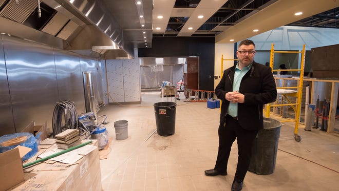 Rick Whittick, general manager, in the open area kitchen at the new Iron Hill Brewery and Restaurant in Rehoboth that will be opening at the end of May.