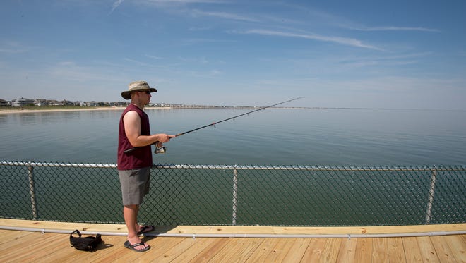 Cast a rod from the Cape Henlopen pier.