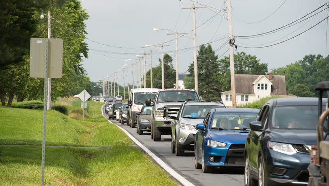 Firefly Music Festival camping traffic along Leipsic Road in Dover.
