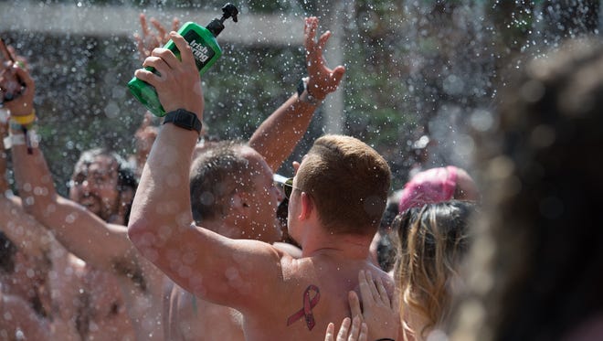 Irish Spring attempts to break the Guinness World Records of the most people showering simultaneously at the Firefly Music Festival in Dover.