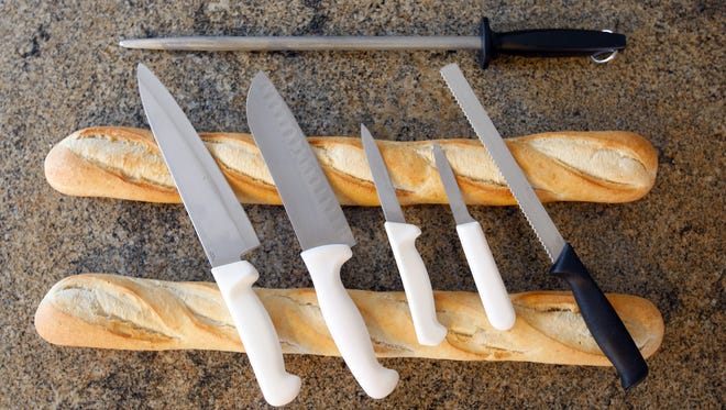 A basic set of knives could include a chef's knife; a santuko, which has a straighter edge than a chef's knife; a couple of paring knives; a serrated knife; and a sharpening steel.