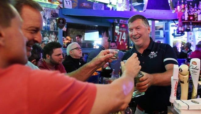 Steve "Monty" Montgomery co-owner of the Starboard in Dewey Beach share's a toast with Kevin Houlihan & John Fakler at his establishment along Coastal Highway and Saulsbury Street.
Special to the News Journal / CHUCK SNYDER