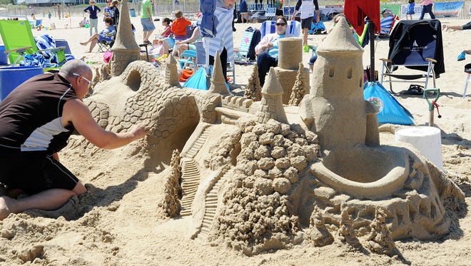 Robert Hamm from Lewisburg, PA. works on his castle as Great weather had many beach artists attend the Rehoboth Beach-Dewey Beach Chamber of Commerce's Annual Sandcastle Contest held on the beach at Brooklyn Avenue in Rehoboth Beach on Saturday September 9th.
Special to the Daily Times / CHUCK SNYDER