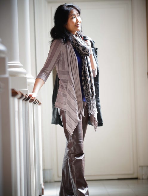 Pianist Hiroko Yamazaki models some of her favorite fashions at First and Central Presbyterian Church.