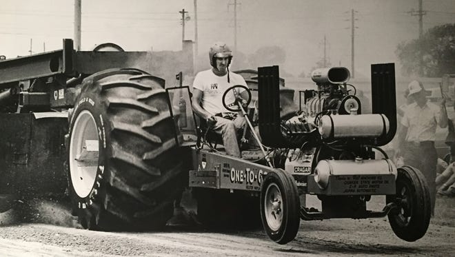 1979: The front wheels of Gary Mills ' tractor leave the ground during the tractor pull. See more vintage images of the Delaware State Fair.