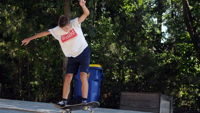 Jake Caldwell, 15 of Rehoboth Beach, grinds the bowl at Epworth Skate Park in Rehoboth Beach. Caldwell has been skating for six years.