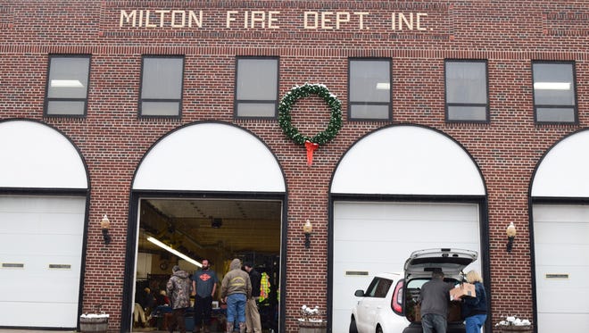 Milton firefighters prepare for the day on Dec. 9.