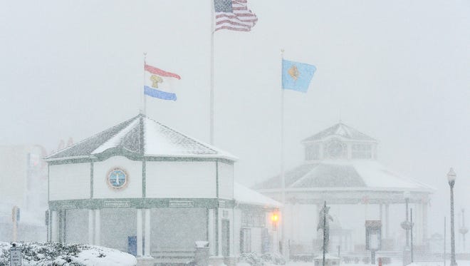 Low visibility caused by windy conditions has made travel difficult on Coastal Highway as snow continues to fall in the Rehoboth Beach area with plows and snow removers trying to keep up. The boardwalk is getting covered by drifting snow as some brave souls did venture out to see it.