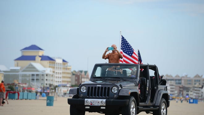 Jeeps flood the beach during the 2017 Jeep Week in Ocean City, Md. Friday, August 25, 2017.