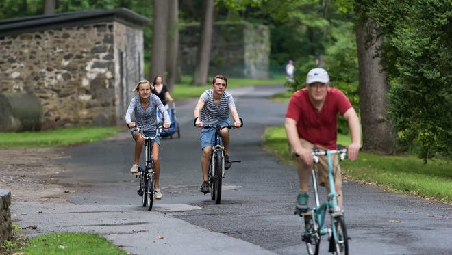 People explore the grounds of Hagley during the weekly Bike & Hike event.
