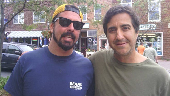 Landenberg, Pa.-based musician/filmmaker Chris Malinowski with Dave Grohl in Lewes in 2013.