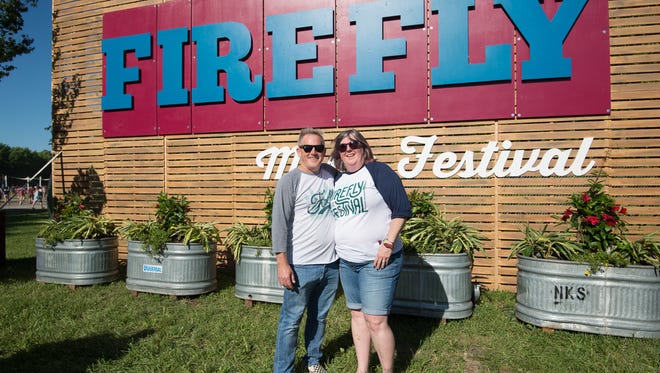 Jeff and Cheryl Dillon of Dover pose for a photo while celebrating their 27th wedding anniversary at the Firefly Music Festival in Dover.