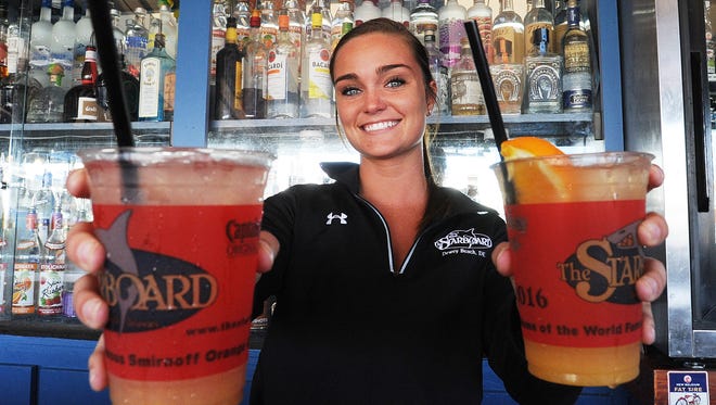 Wilmington's Eileen Marge serves up Orange and Grapefruit Crushes at The Starboard earlier this year.