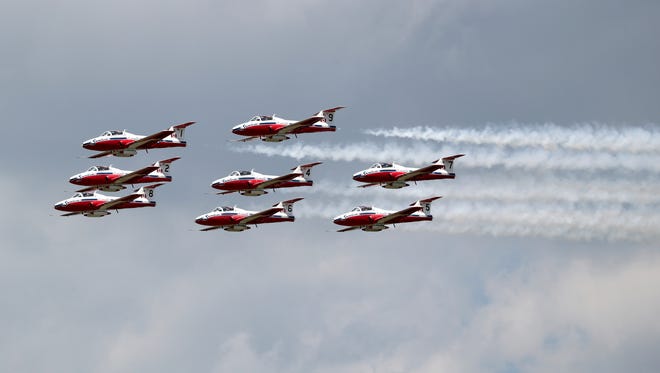 Canadian Forces Snowbirds jet team fly in formation over Willow Run Airport in Ypsilanti. The jets, which are CL 41 Tutors, are in town for a one day airshow on Wednesday  called the Wild Wednesday at Willow Run.