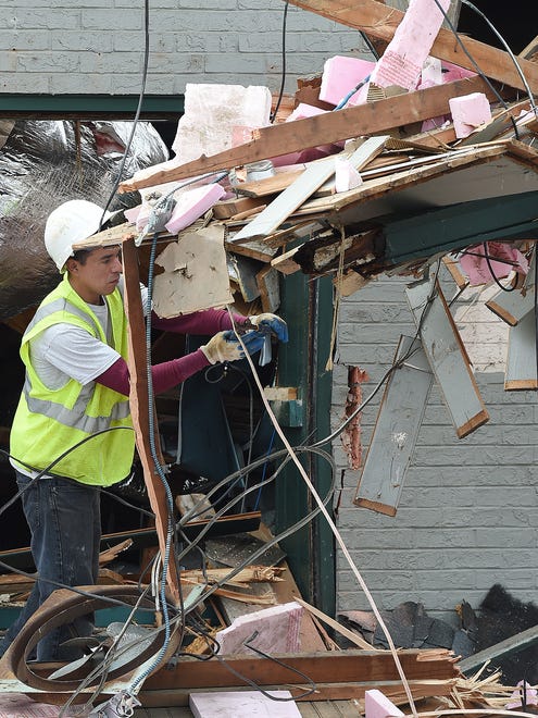 Demolition at the Dogfish Head's old brewpub on Rehoboth Ave. in downtown Rehoboth Beach began on Monday, Nov. 6, 2017 to make way for an outside courtyard between Chesapeake & Maine Restaurant and the new Dogfish Head Brewing and Eats.Special to the Daily Times / CHUCK SNYDER