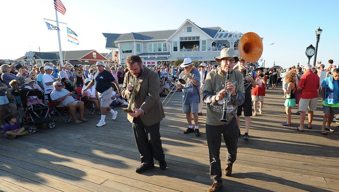'Mourners' gathered to send off the summer of 2017 at the annual Bethany Beach Jazz Funeral on the boardwalk in Bethany Beach on Labor Day, Monday.