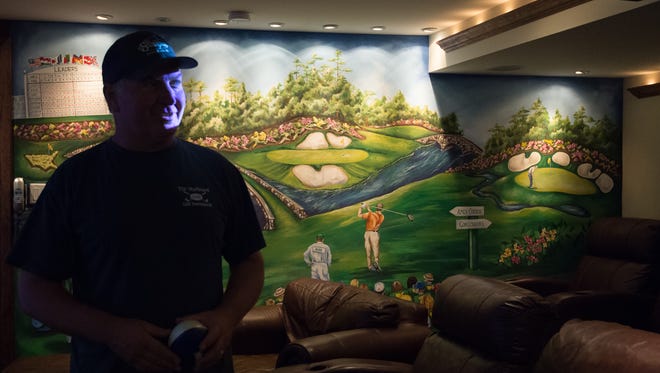 View of a golf scene mural at the home of Steve "Monty" Montgomery, co-owner of The Starboard in Dewey Beach.