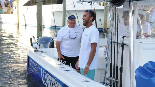 Rock Doc, of Selbyville, Del., pulls out of the marina after weighing in on the fourth day of the 43rd White Marlin Open.