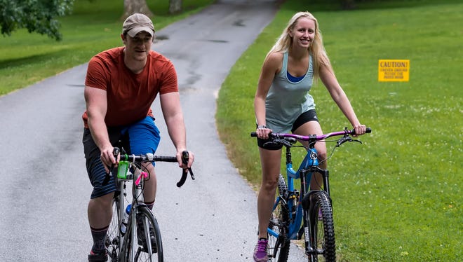 Eric Henderson and Kristine Ziemba, both of Springfield, Pa., enjoy the Bike & Hike event at Hagley Museum.