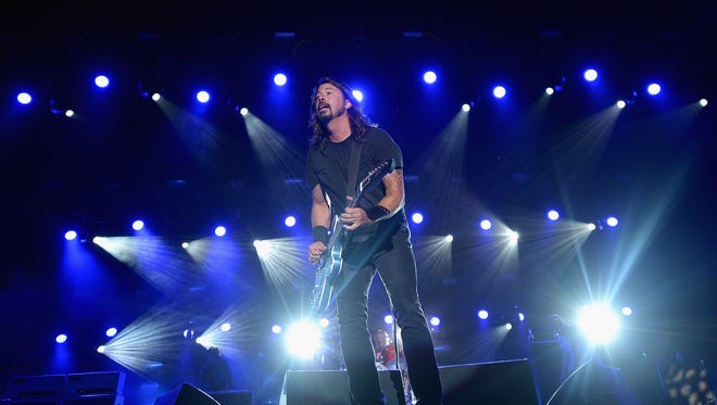 Dave Grohl of the Foo Fighters performs onstage during day 2 of the Firefly Music Festival on June 20, 2014 in Dover.