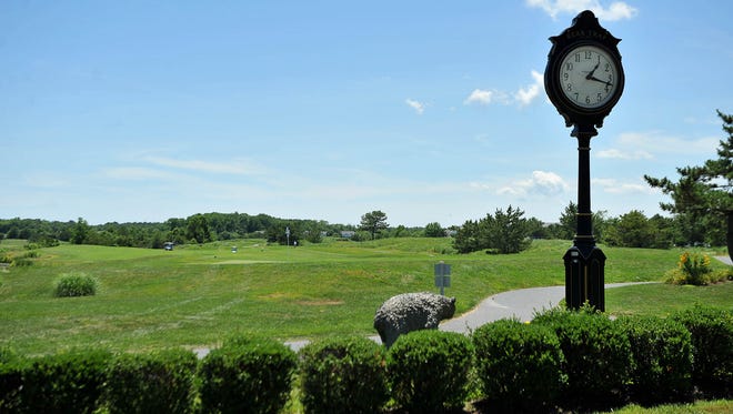 The landmark clock and bear sculpture over look the ninth hole of the Grizzly course at the Bear Trap Dunes in Ocean View on July 11.