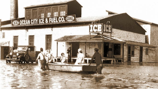 The day after the famous August storm of 1933 hit the Eastern Shore, boats were needed to move residents and employees in Ocean City. The Ocean City Ice Plant, on Somerset Street and Philadelphia Avenue, had water flowing inside the building.
